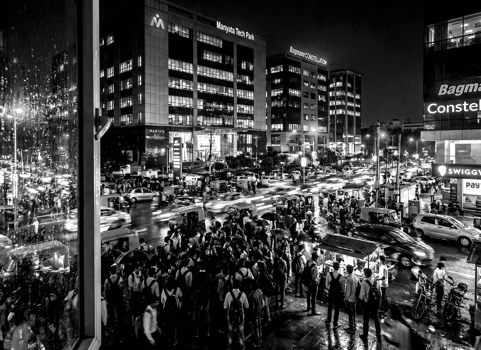 Looking out the apartment window at Bengaluru's IT crowd